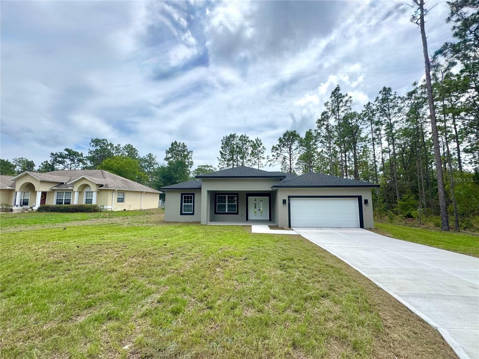 Single Family Residence at 628 W HERONSBILL LN, DUNNELLON, photo 2 of 29