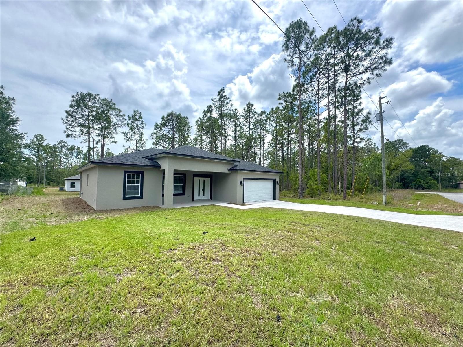 Single Family Residence at 628 W HERONSBILL LN, DUNNELLON, photo 4 of 29