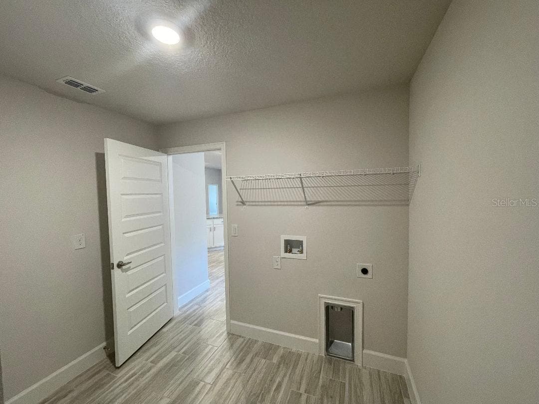 Laundry room - 13374 OGDEN GLADE RD, DADE CITY
