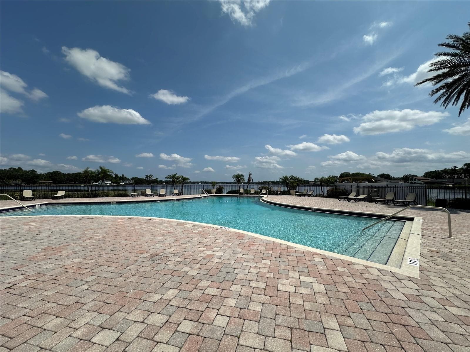Community pool on lake - 13709 JUNIPER BLOSSOM DR #0, TAMPA