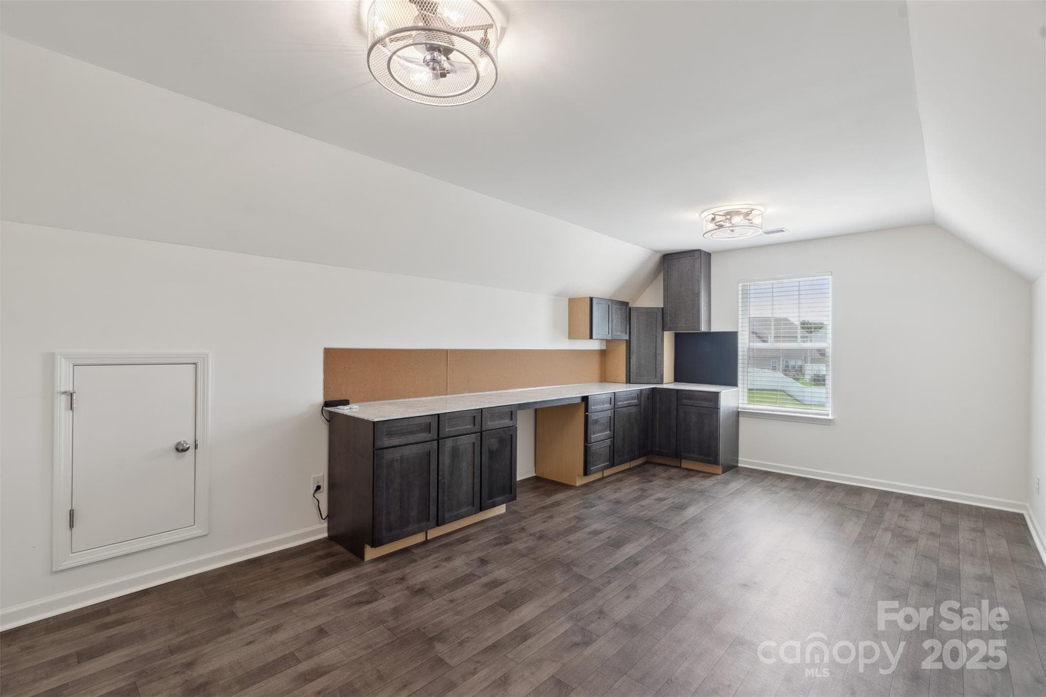 Generous bonus room with built-in desk - 117 Carmine Court, Troutman