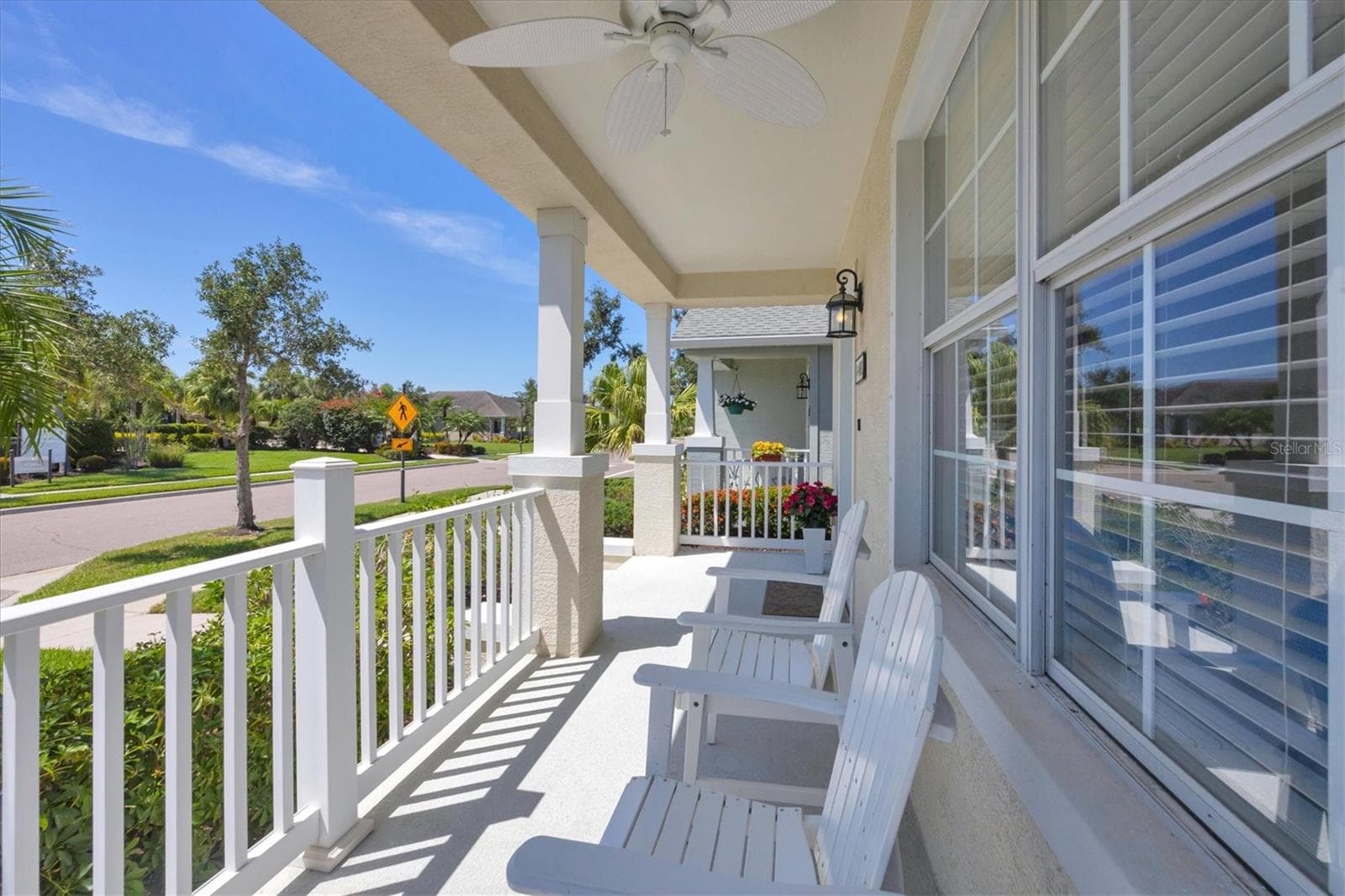 Front Porch directly looks across to the amenity center and open space - 4811 WOODBROOK DR, SARASOTA