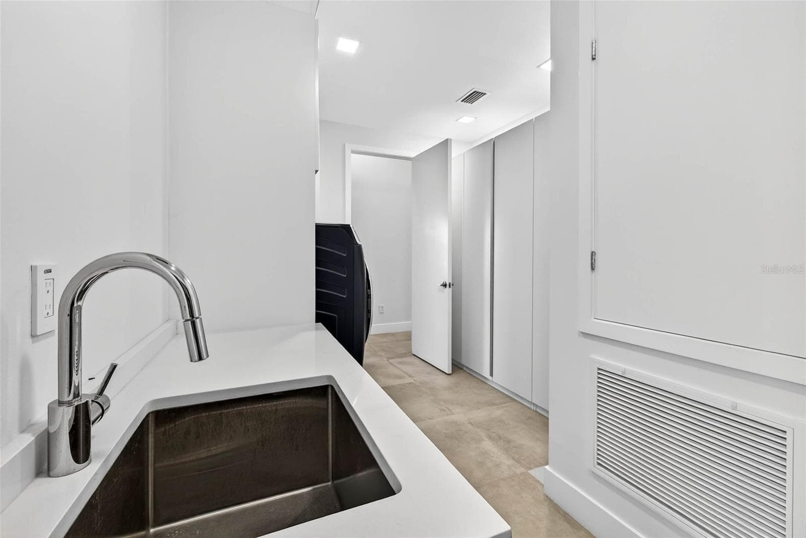 Laundry Room Sink - 131 FOREST HILLS DR, REDINGTON SHORES