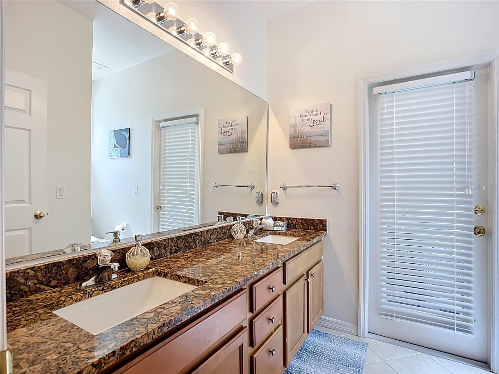 Bathroom 3 with a door to the patio/backyard - 3409 61ST TER E, ELLENTON