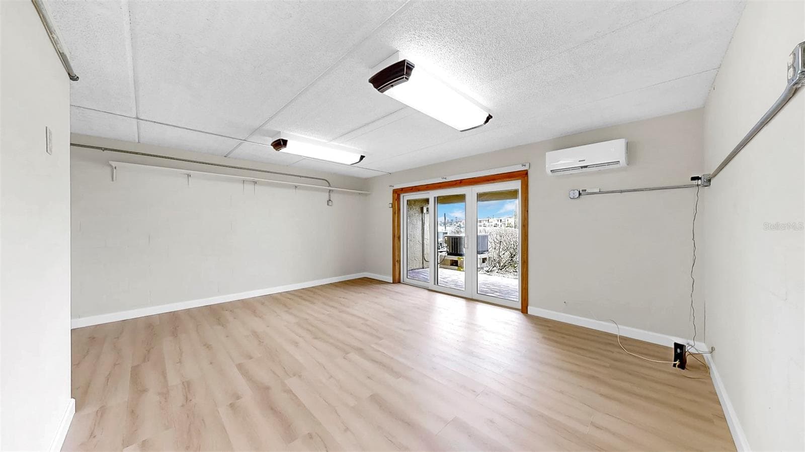 Ground Floor Bonus Room with BRAND NEW Exterior Mini-Split & Exterior A/C Units - 459 HAVEN POINT DR, TREASURE ISLAND
