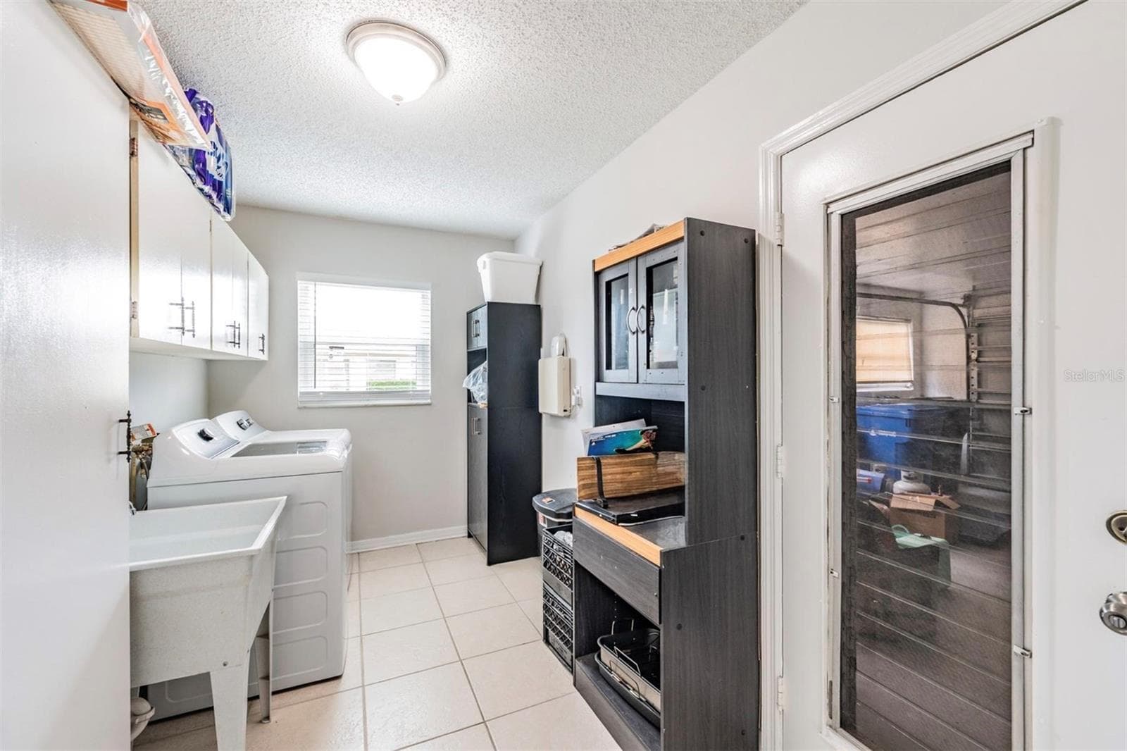 oversized laundry room - 1209 WILD FEATHER LN, SUN CITY CENTER