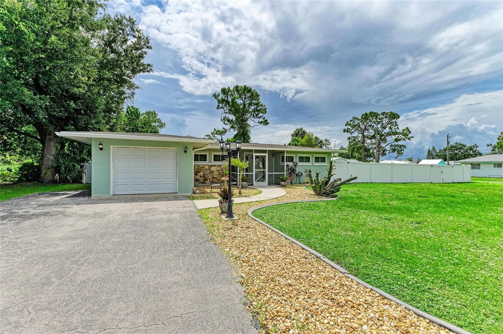 Single Family Residence at 557 READING ST NW, PORT CHARLOTTE, photo 2 of 47