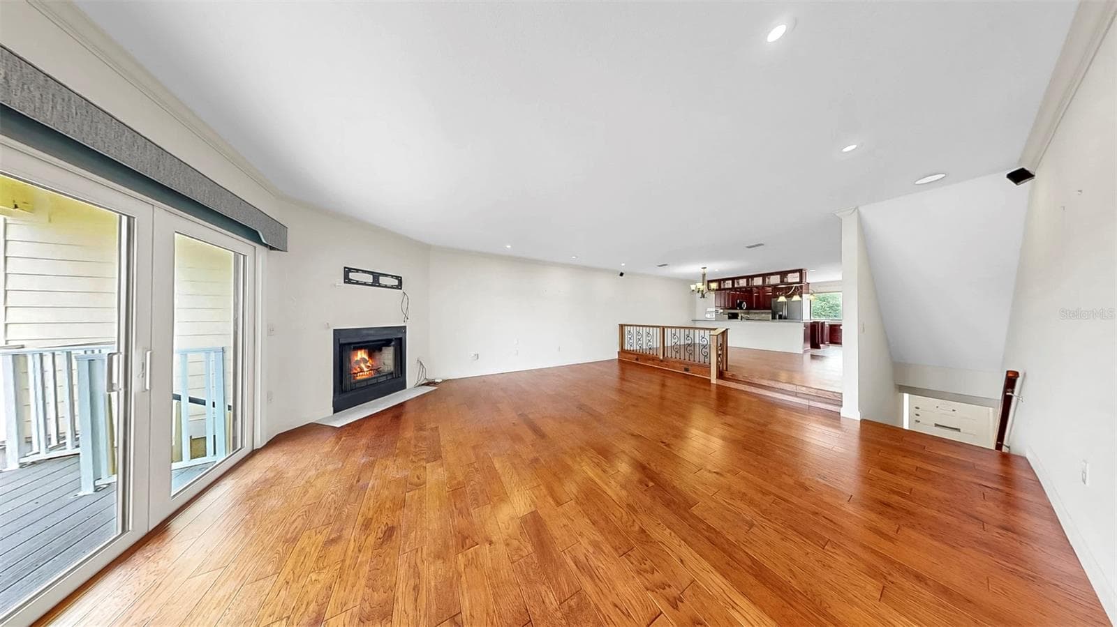Living Room with Wood-Burning Fireplace - 459 HAVEN POINT DR, TREASURE ISLAND