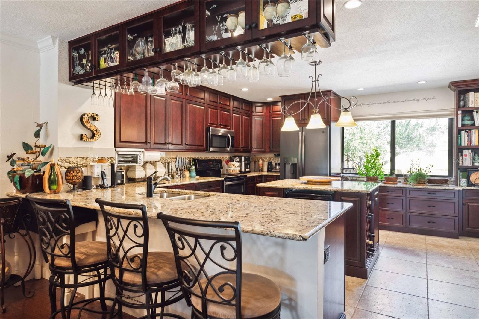 Kitchen with Sellers' Items - 459 HAVEN POINT DR, TREASURE ISLAND
