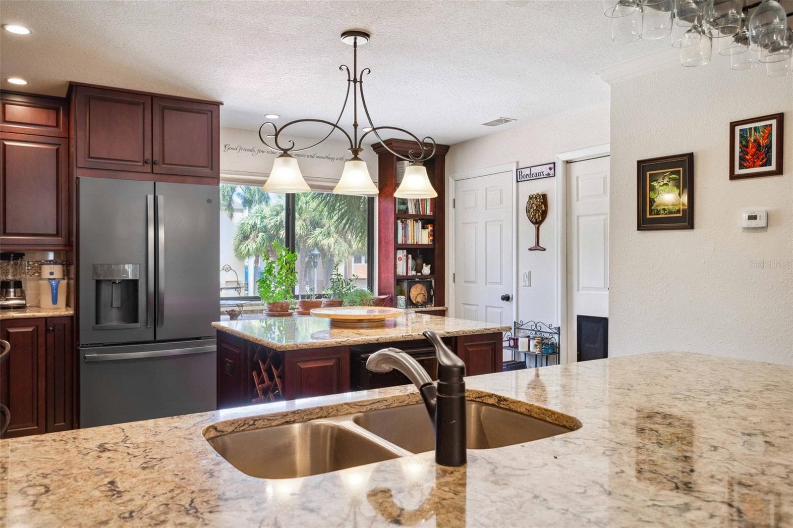 Kitchen with Sellers' Items - 459 HAVEN POINT DR, TREASURE ISLAND