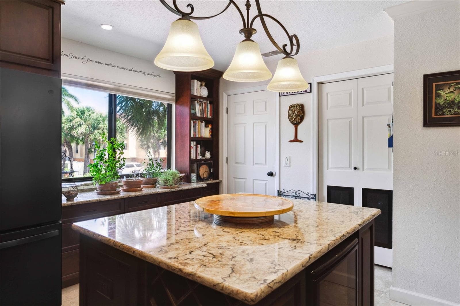 Kitchen with Sellers' Items - 459 HAVEN POINT DR, TREASURE ISLAND