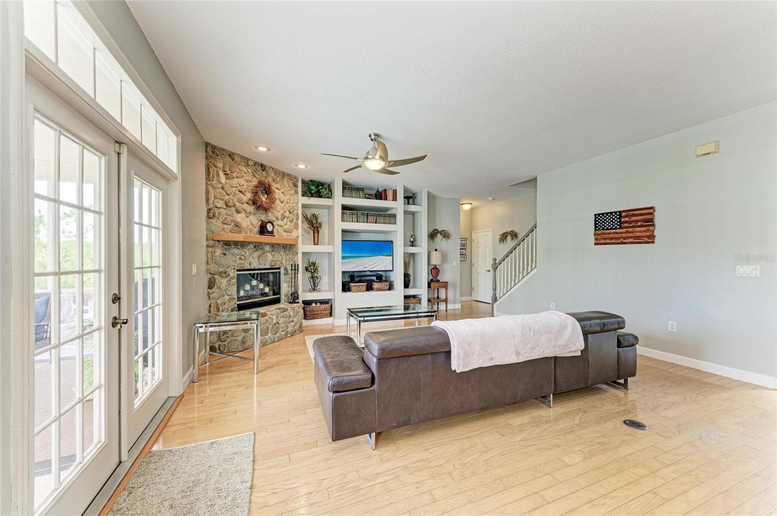 Double French Doors with Transom Window brings in all the Natural Light - 8331 241ST ST E, MYAKKA CITY