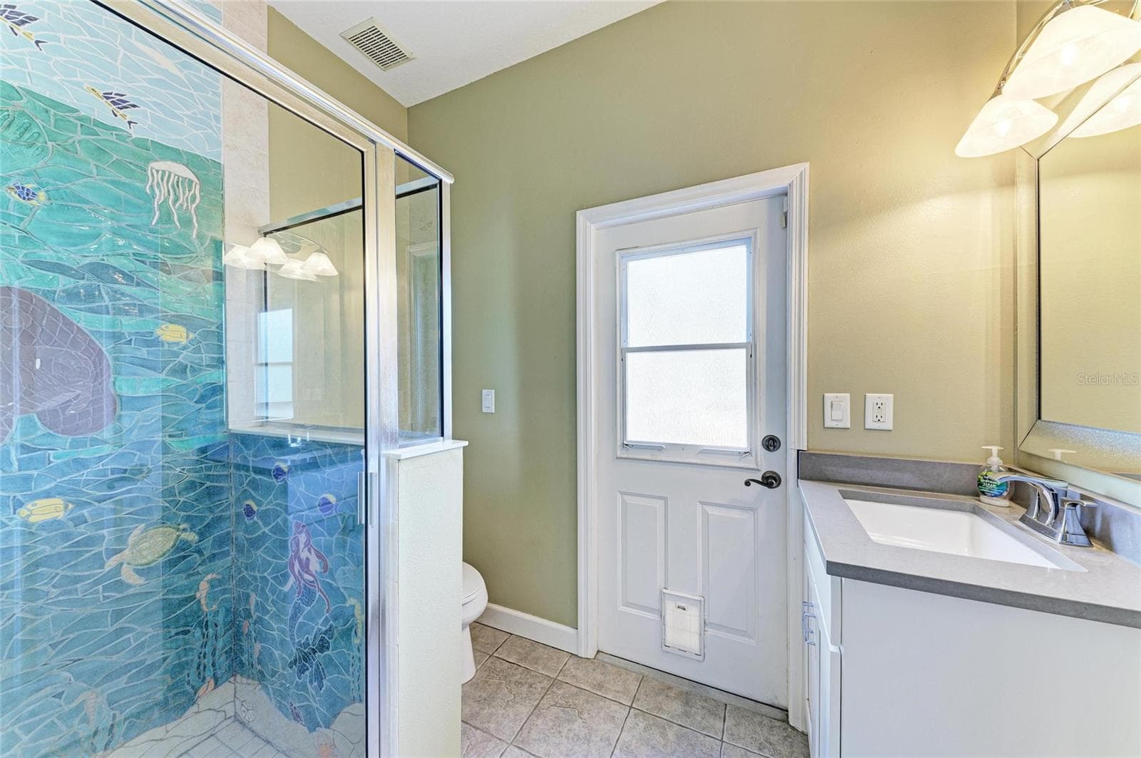 full pool bath off kitchen - 8331 241ST ST E, MYAKKA CITY