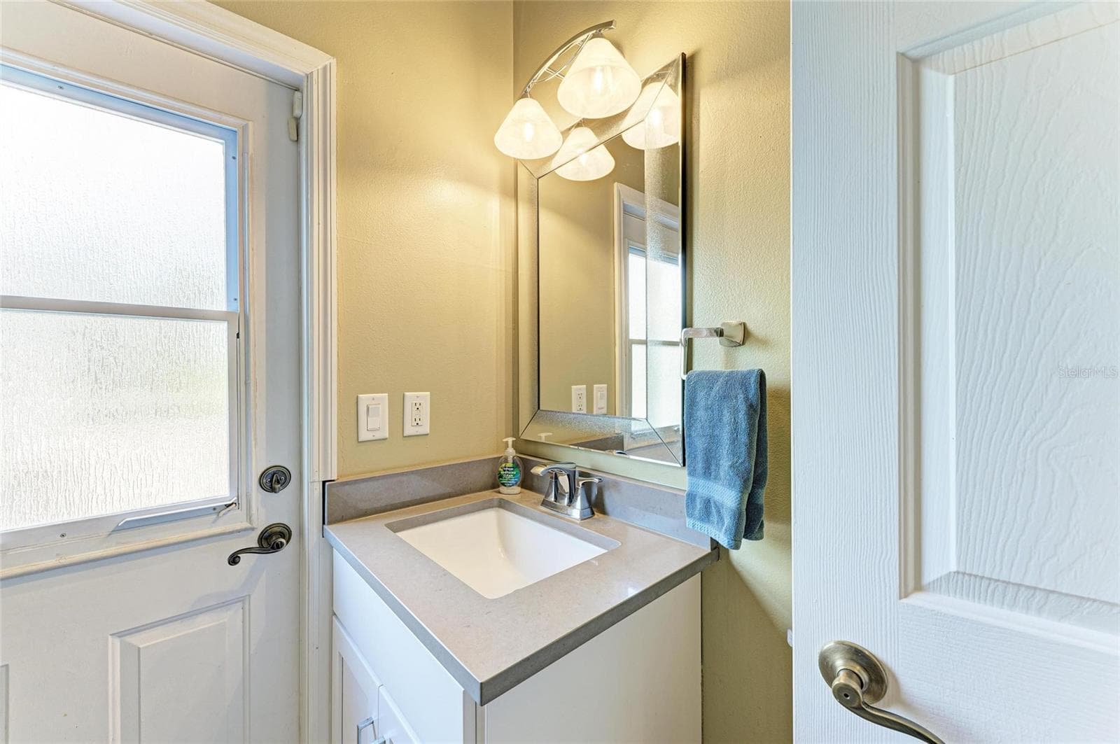 first floor bathroom off kitchen - 8331 241ST ST E, MYAKKA CITY