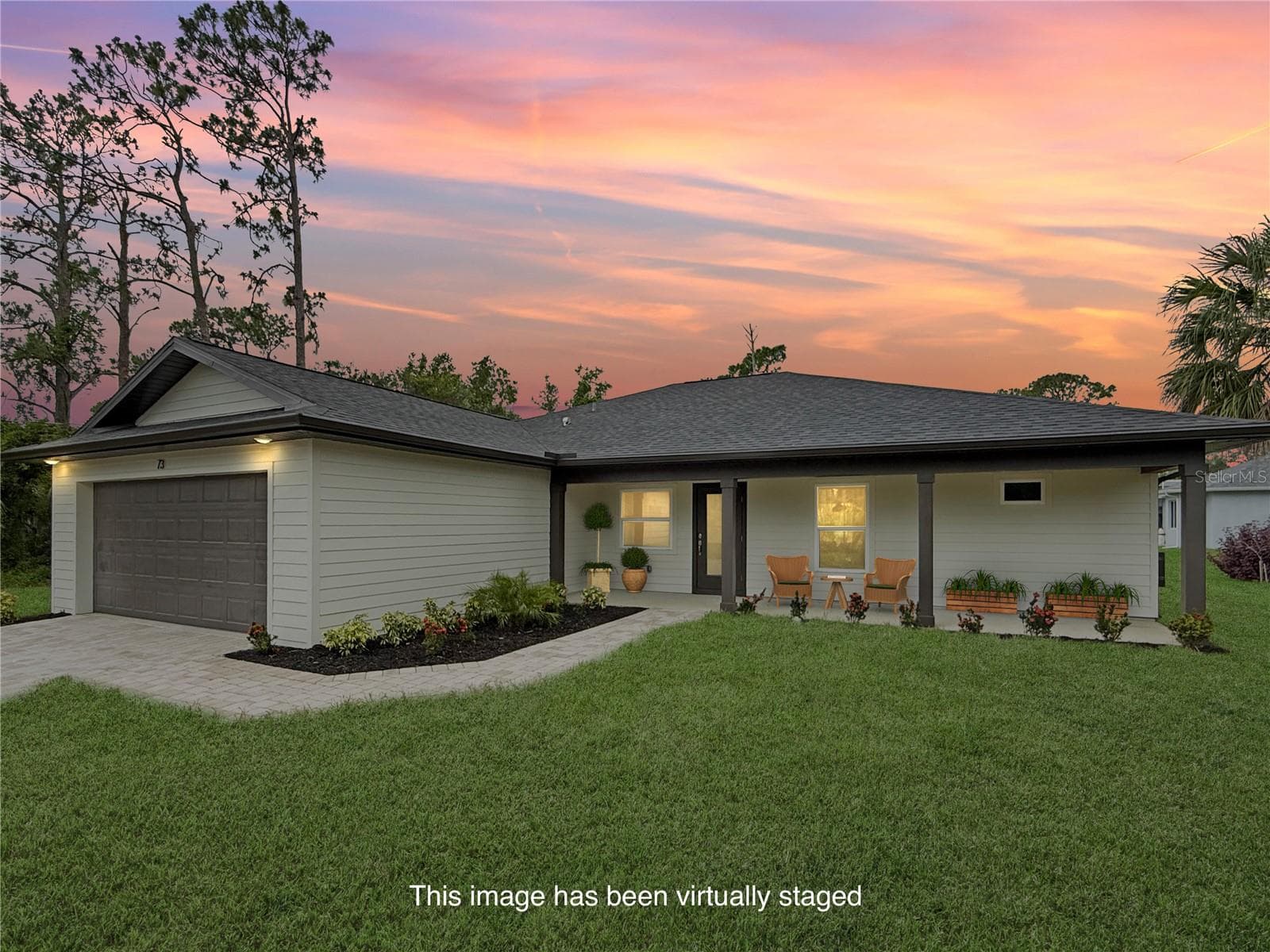 Front Elevation featuring Front Porch - 73 BARSTOW ST, PORT CHARLOTTE