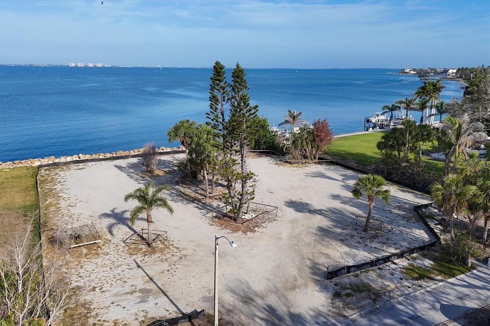 Lot lines extend beyond black silt fence - 603 INDIAN BEACH LN, SARASOTA