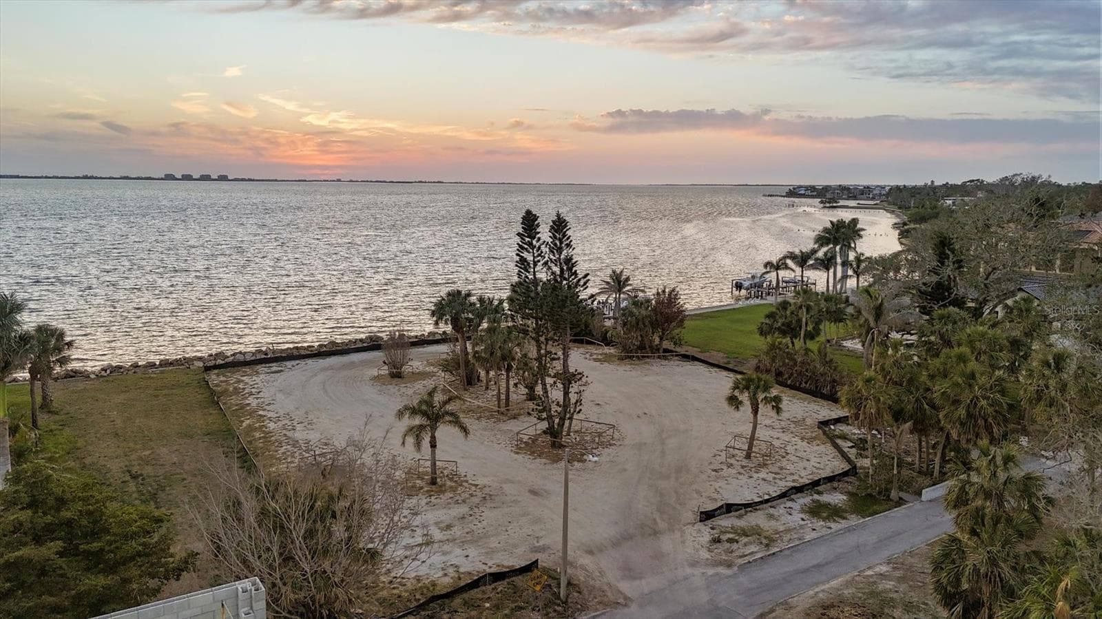 Lot lines extend beyond black silt fence - 603 INDIAN BEACH LN, SARASOTA