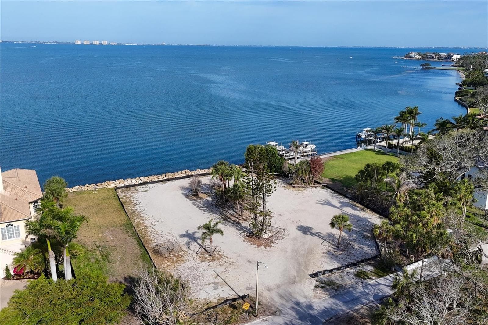 Lot lines extend beyond black silt fence - 603 INDIAN BEACH LN, SARASOTA