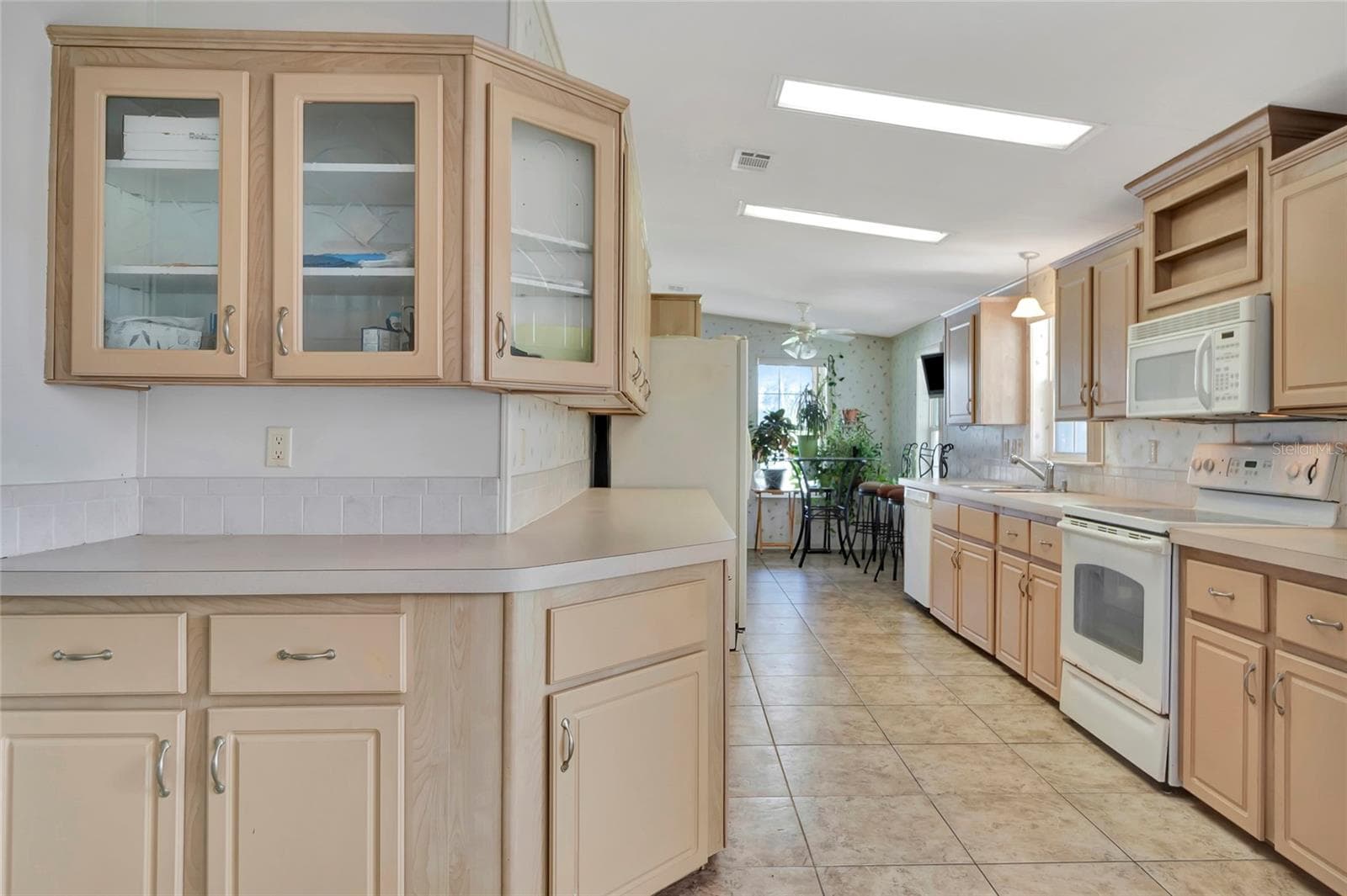 Spacious Kitchen Ample Cabinets and Counter Space - 1128 FOREST LN, TAVARES