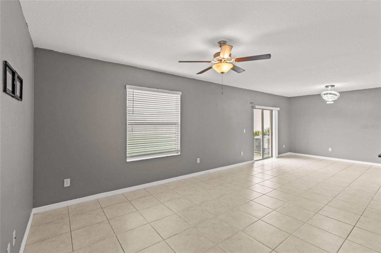 Open layout of the living and dining area - 16671 KINGMAN REEF ST, WIMAUMA
