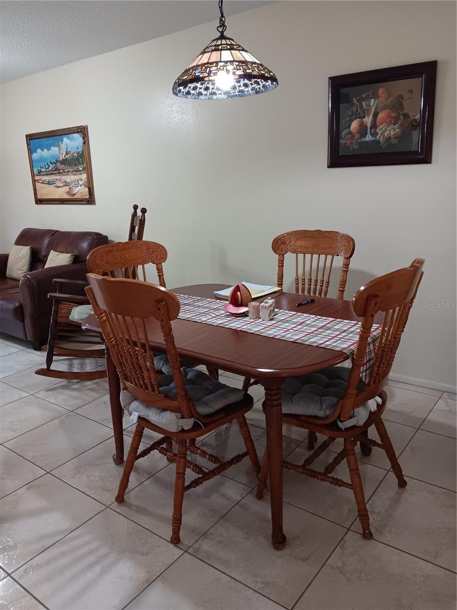 Dinette Area-with former furniture - 2806 N POWERS DR #8, ORLANDO