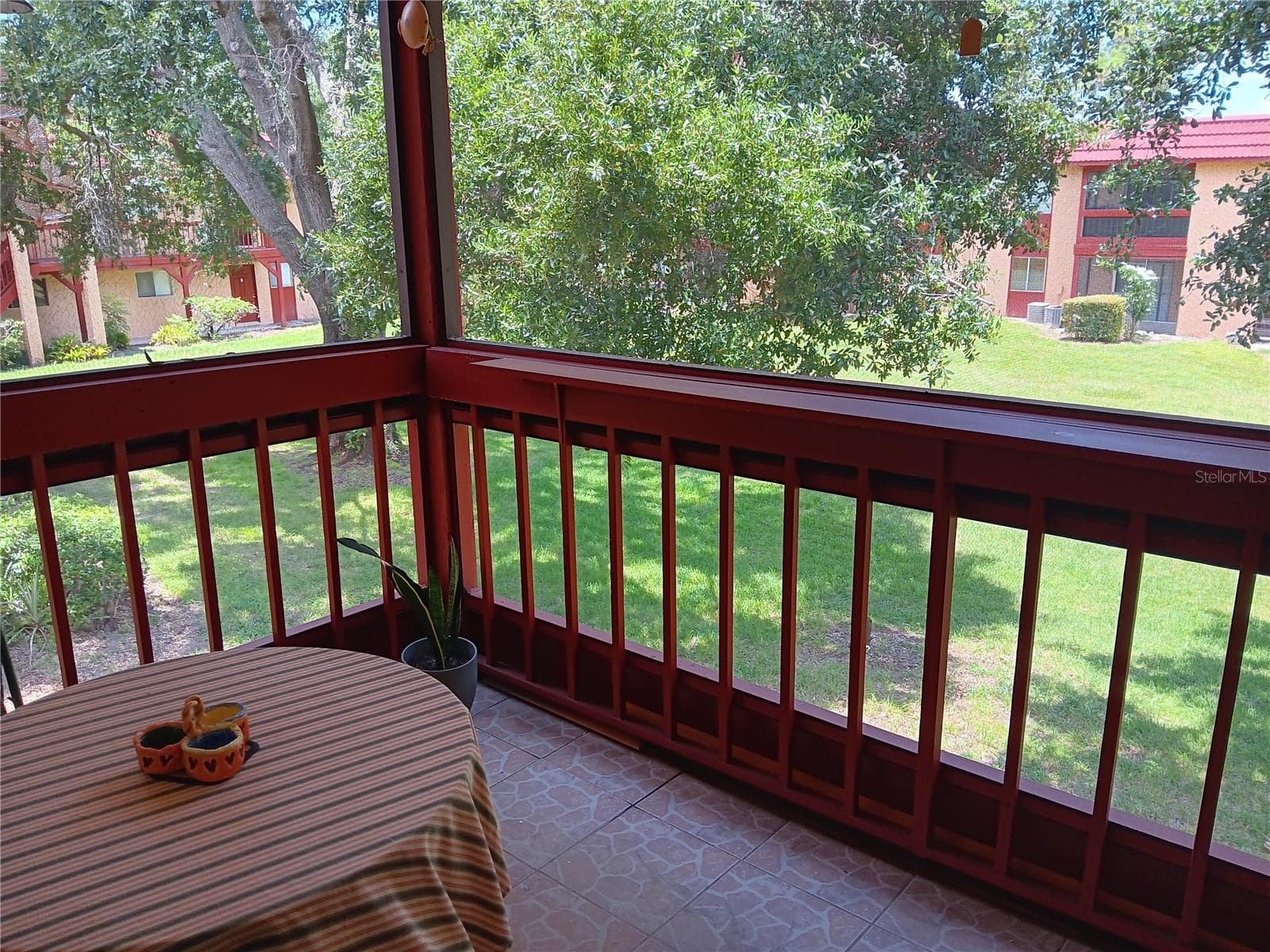View of backyard from balcony - 2806 N POWERS DR #8, ORLANDO