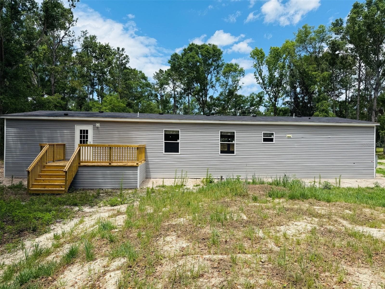 Manufactured Home at 7180 HWY 90, LIVE OAK, photo 2 of 8