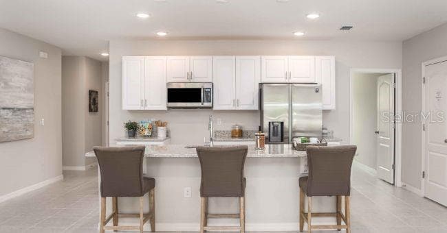 Model home - actual features may vary. - 5268 HANFORD AVE, SPRING HILL