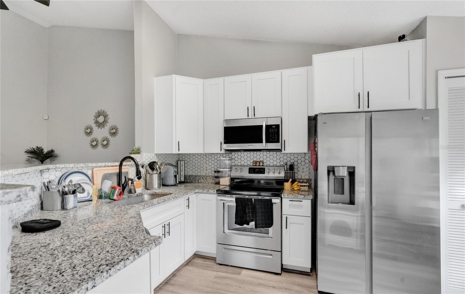 Kitchen - Photo has been digitately enhanced. - 9616 RIVER WALK CT, ORLANDO