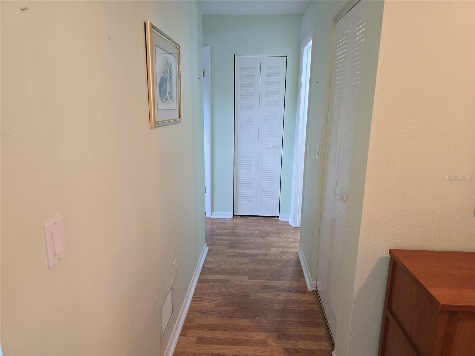 HALLWAY TO THE BEDROOMS. - 5603 80TH ST N #410, ST PETERSBURG