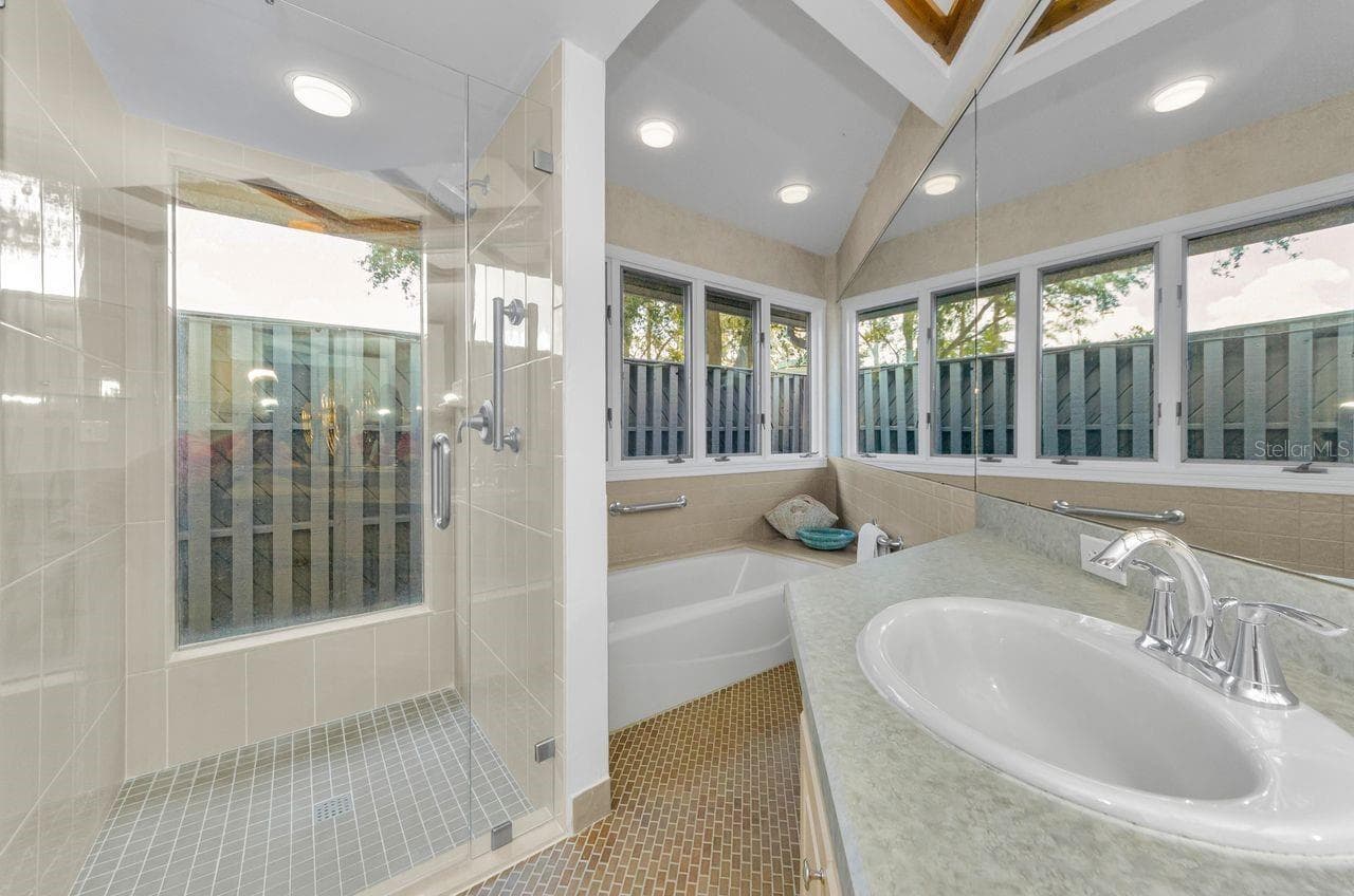 Updated shower and great tile floors! - 10479 LONGWOOD DR, SEMINOLE