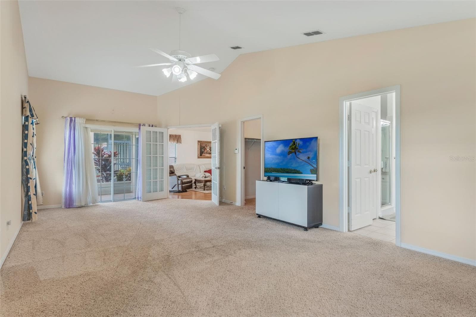 Primary Bedroom with view of water - 5389 WATERVISTA DR, ORLANDO