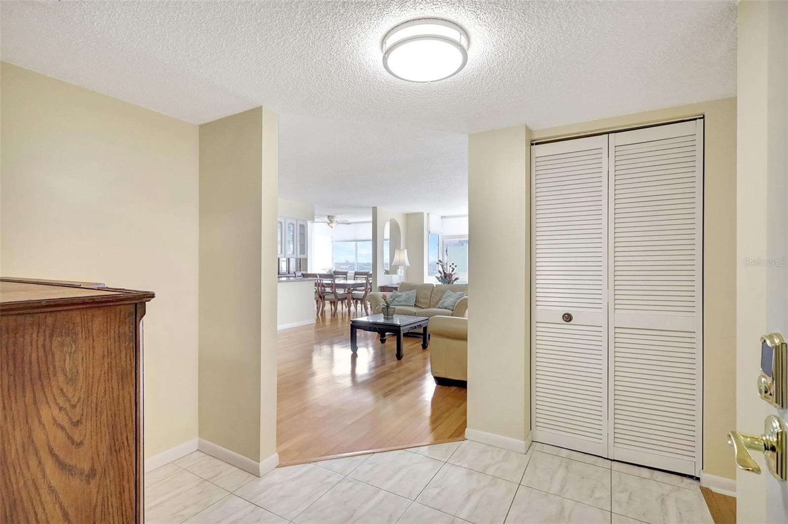 As you enter the unit there ia a large foyer with views into the home - 660 ISLAND WAY #708, CLEARWATER BEACH