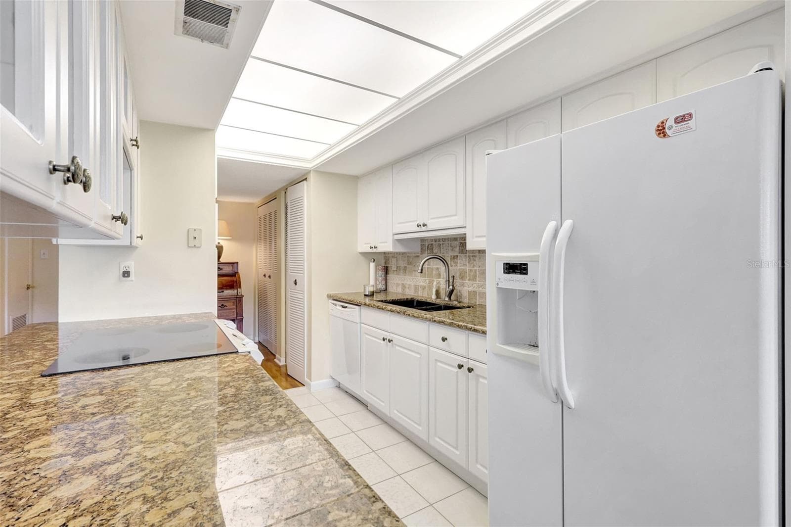 There is plenty of storage off the kitchen - 660 ISLAND WAY #708, CLEARWATER BEACH