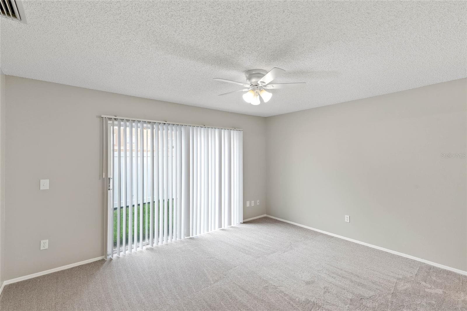 Primary Bedroom with Sliders to Rear - 1726 TROPICAL CT, TAVARES