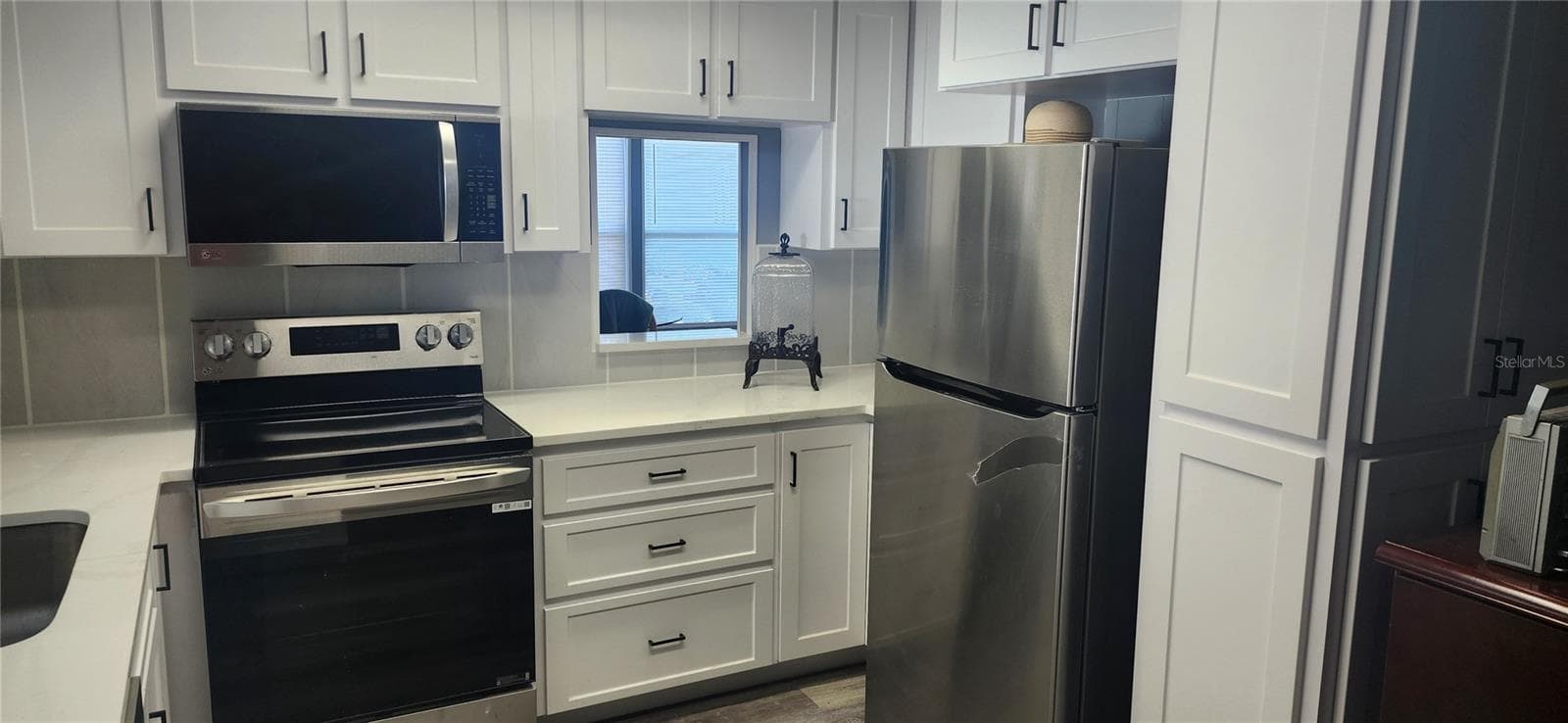 Manufactured Home at 3702 TIKI DR, HOLIDAY, photo 23 of 25