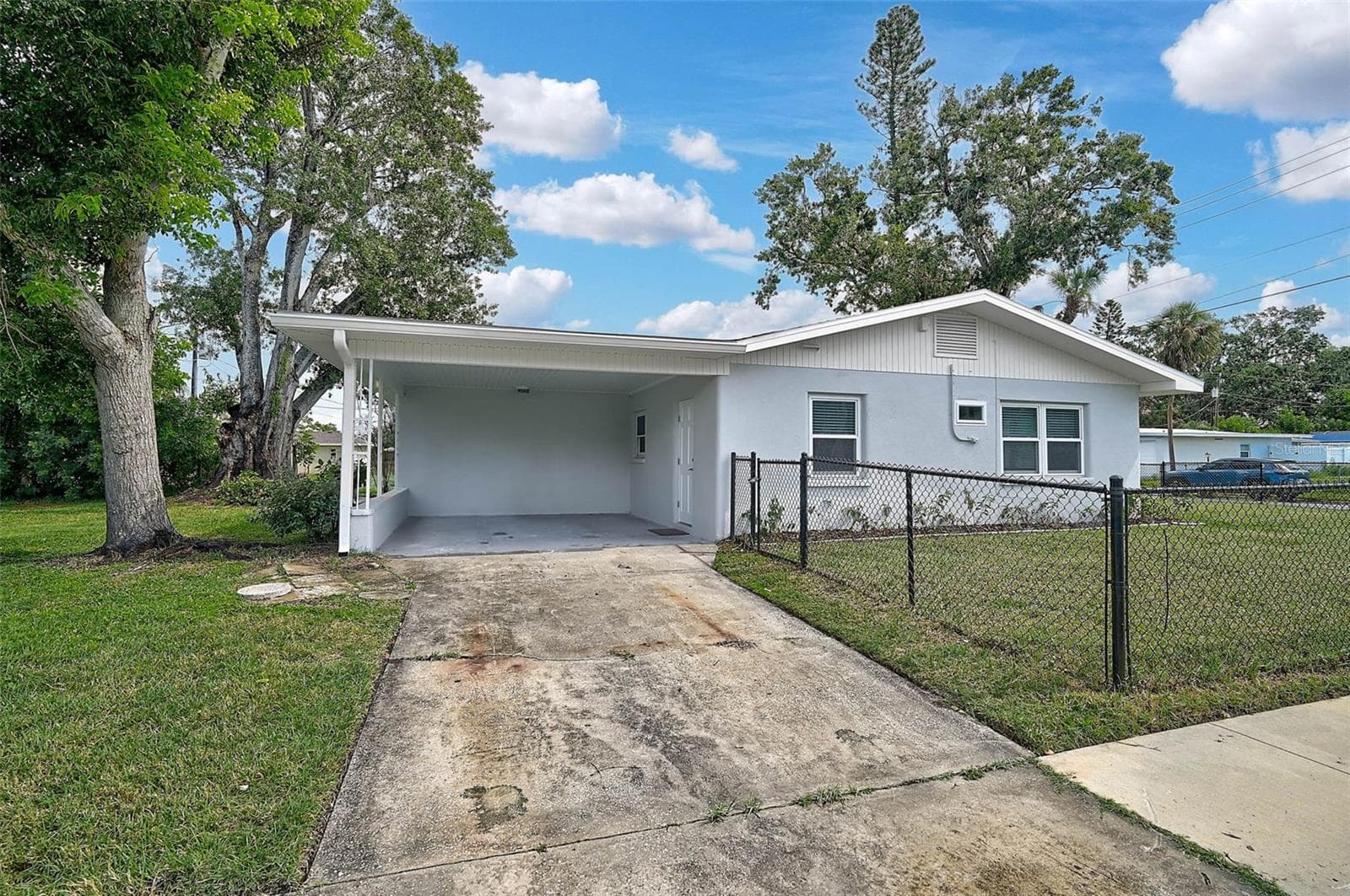 Carport on Side of Home - 102 20TH ST NE, BRADENTON
