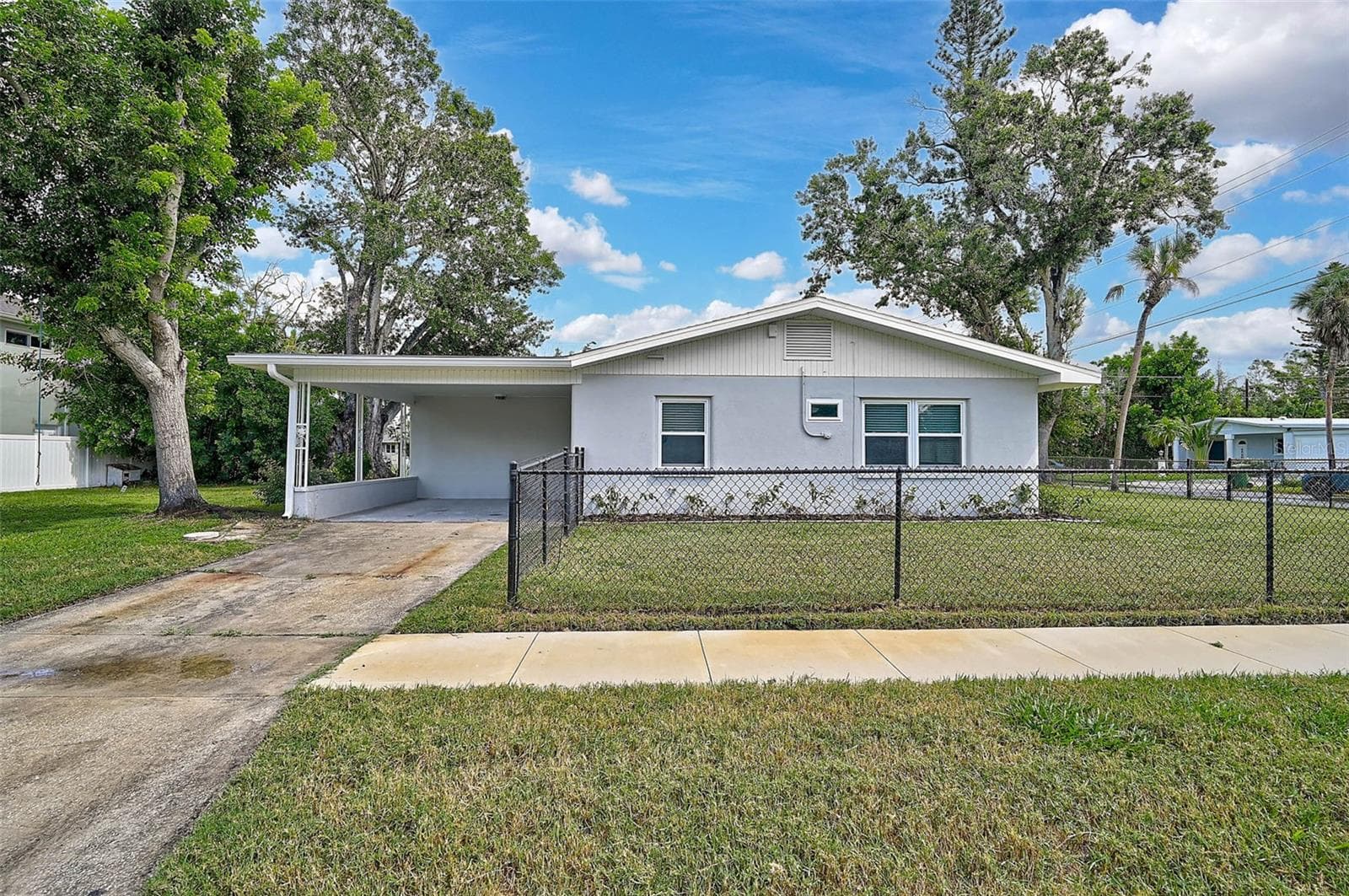 Carport on Side of Home - 102 20TH ST NE, BRADENTON