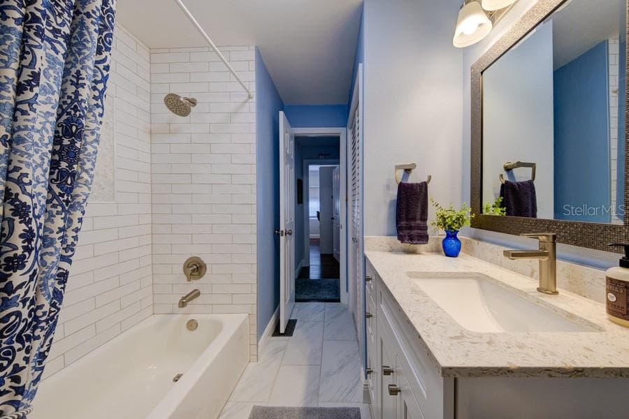 MAIN BATHROOM WITH TUB/SHOWER COMBO - 1916 ILLINOIS AVE, BRADENTON