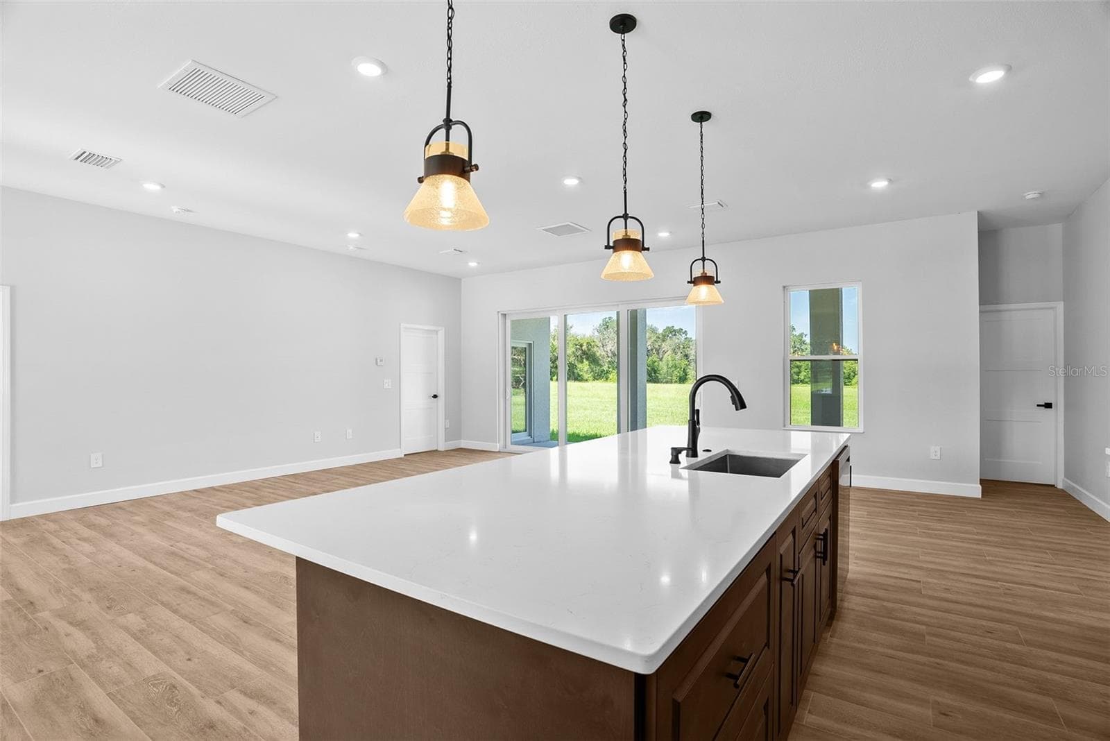 Kitchen looking towards living room - 13219 NEWGENT RD, SAN ANTONIO