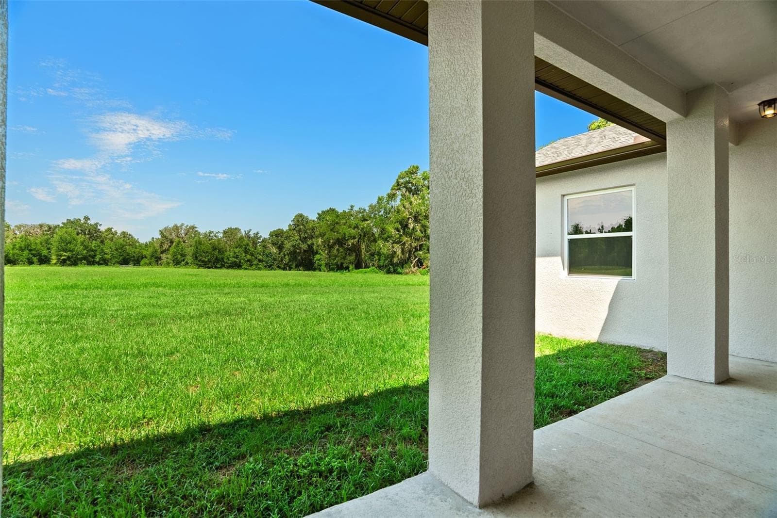 back porch for great sunset views - 13219 NEWGENT RD, SAN ANTONIO
