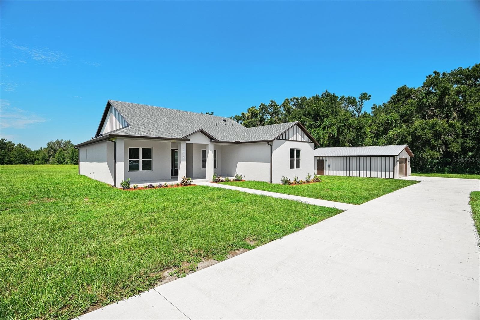 front of home with driveway - 13219 NEWGENT RD, SAN ANTONIO