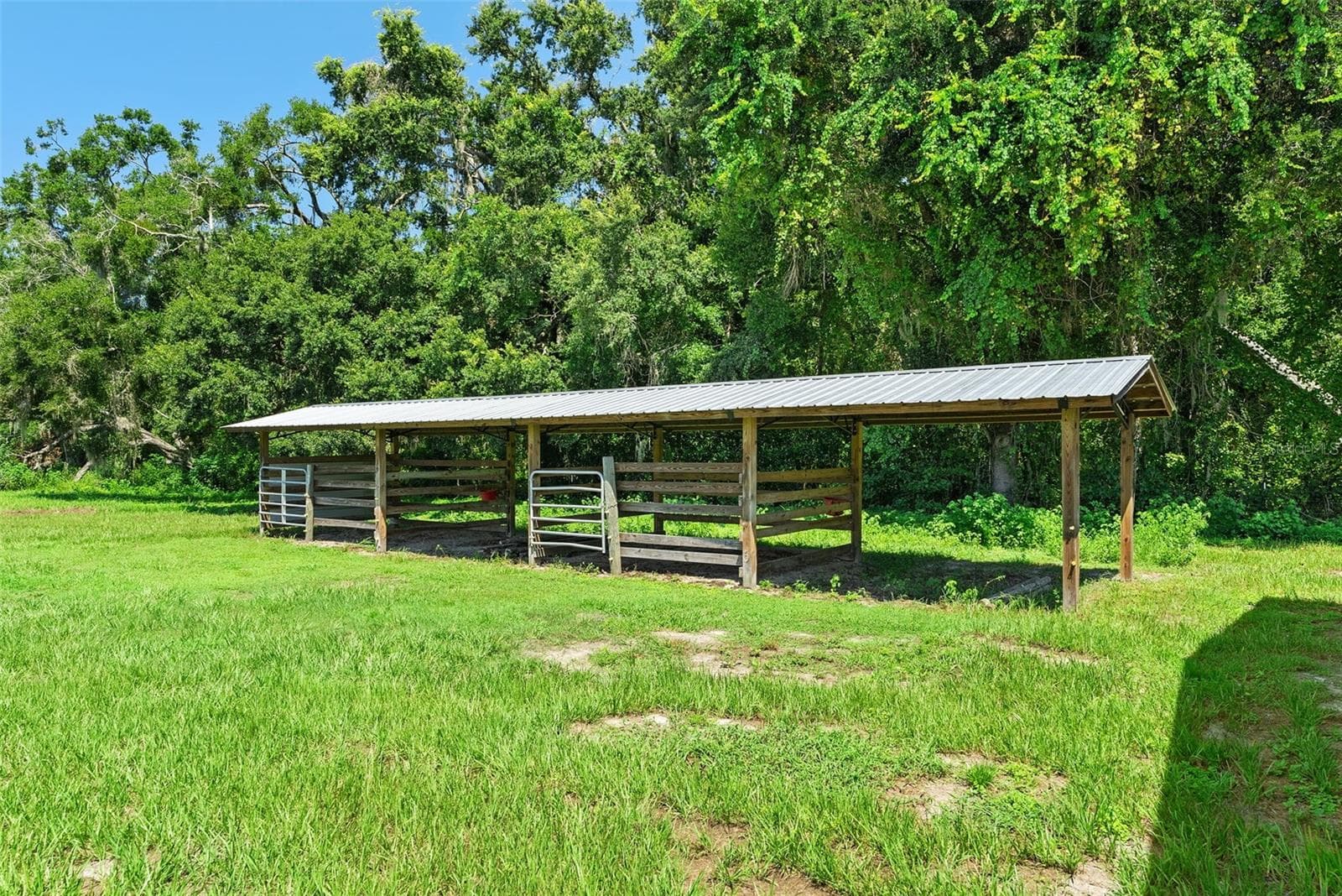open pole barn with stalls - 13219 NEWGENT RD, SAN ANTONIO