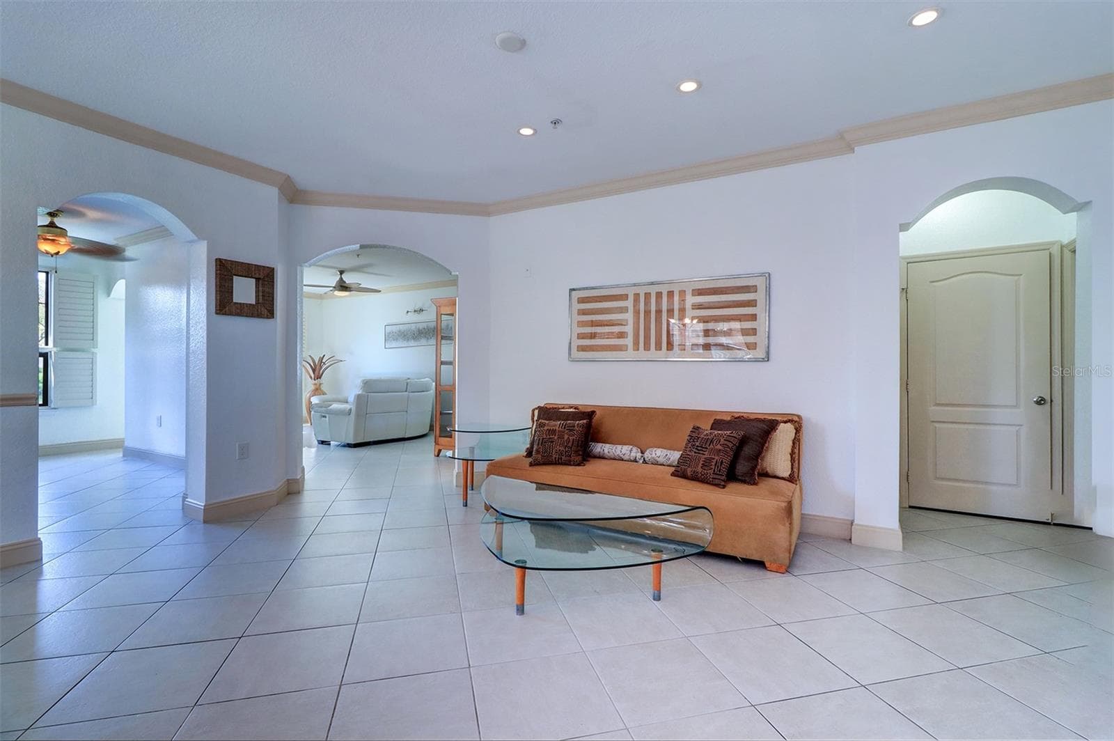 Living room open area as you enter the foyer into the townhome - 2757 VIA CIPRIANI #1114A, CLEARWATER
