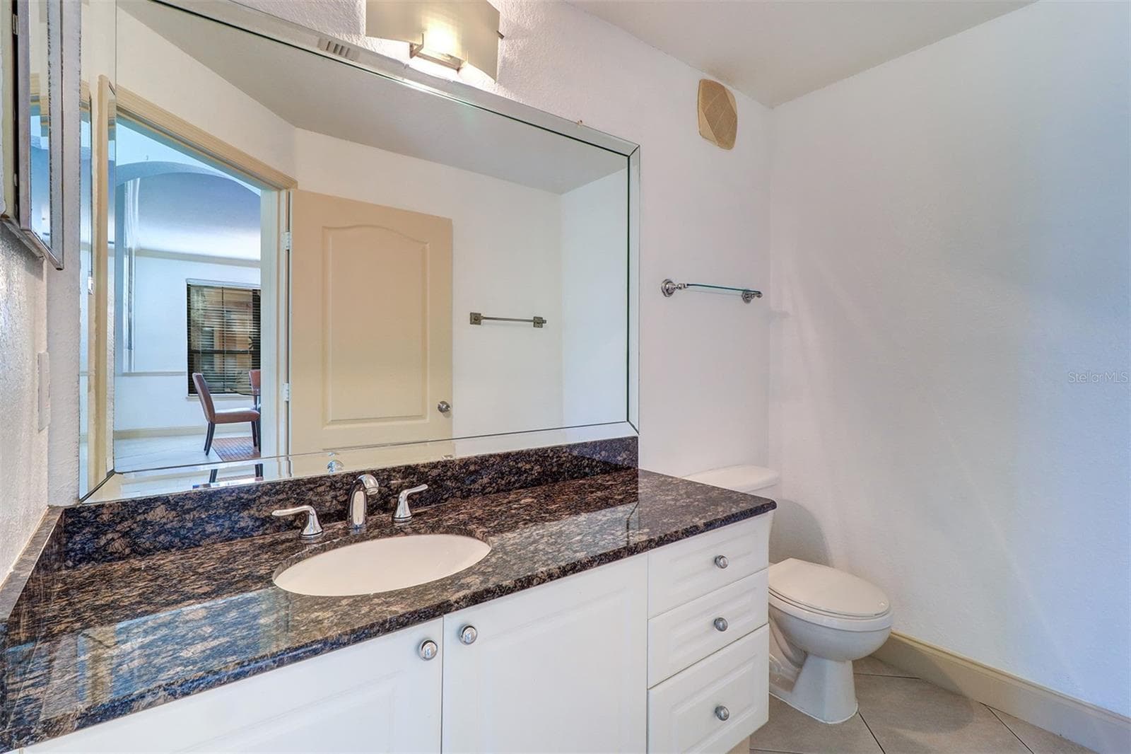 First floor half bath with oversized vanity - 2757 VIA CIPRIANI #1114A, CLEARWATER