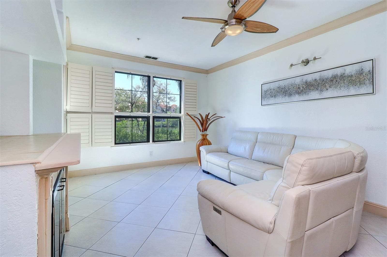 Family room looking out to the waterfront - 2757 VIA CIPRIANI #1114A, CLEARWATER