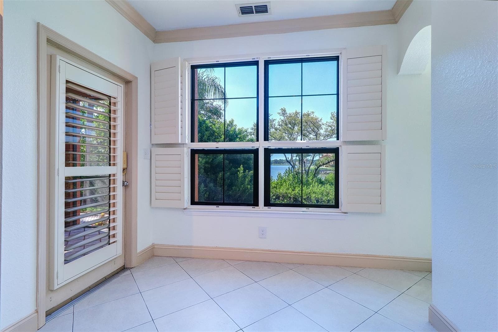 View of the waterfront from the breakfast nook - 2757 VIA CIPRIANI #1114A, CLEARWATER