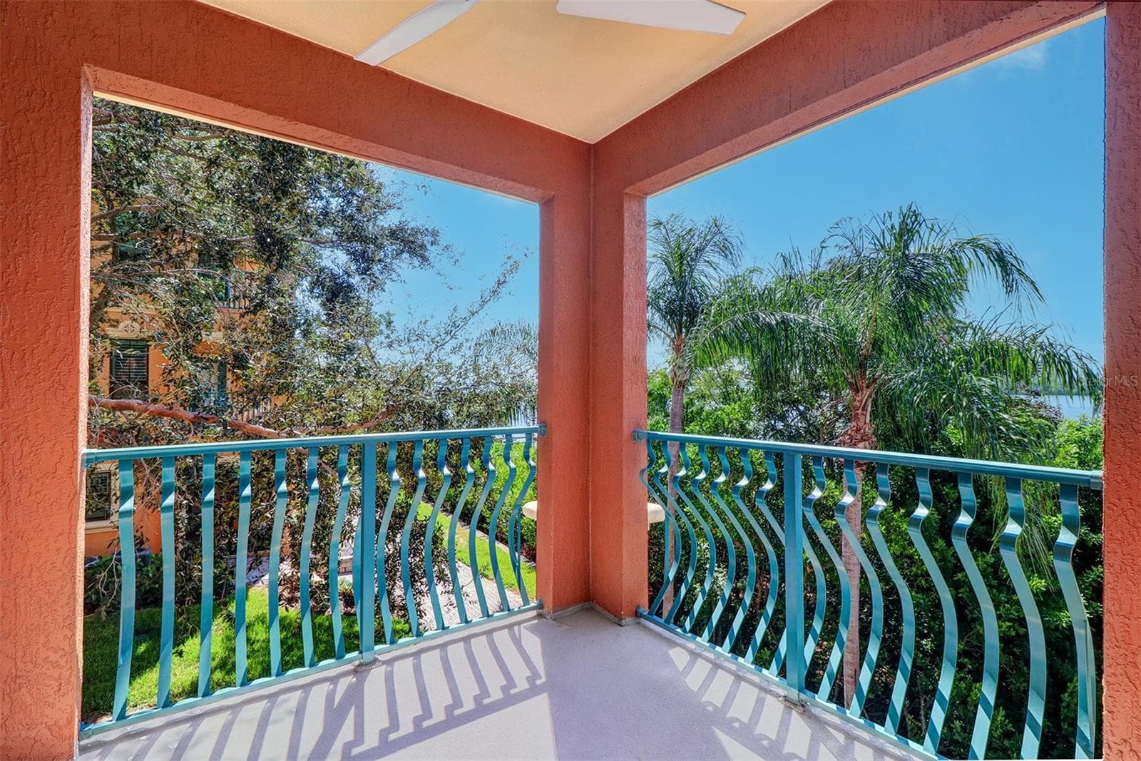 Terrace/balcony from the primary bedroom looking over the waterfront - 2757 VIA CIPRIANI #1114A, CLEARWATER