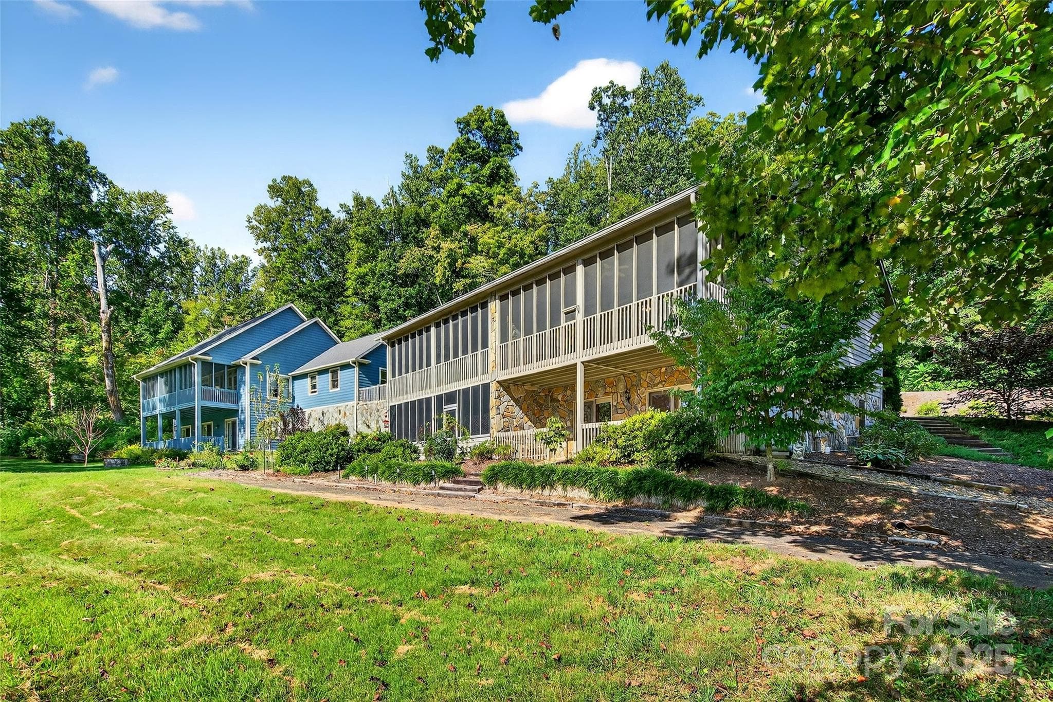 Golf course side of unit, Main level screened lower level open patio. - 307 #7 Blue Ridge Drive S, Marion