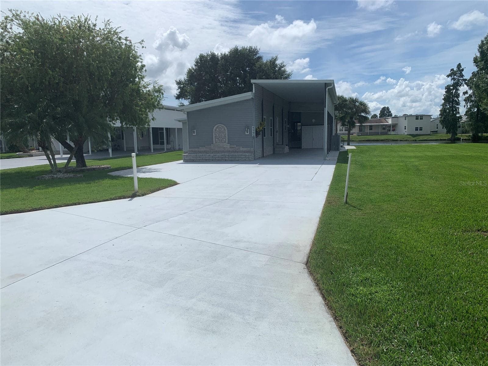 Manufactured Home at 4995 MOUNT OLIVE SHORES DR, POLK CITY, photo 4 of 75
